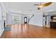 Bright, airy living room featuring hardwood floors and ample natural light at 740 Marcus Nyah Ct, Atlanta, GA 30349