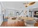 Bright, airy living room with hardwood floors, fireplace, and ample natural light at 740 Marcus Nyah Ct, Atlanta, GA 30349