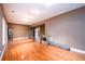 Spacious basement featuring hardwood floors, recessed lighting, and ample storage space at 10090 Jones Bridge Rd # 2, Alpharetta, GA 30022
