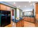 Well-equipped kitchen with a functional island and stainless steel appliances at 10090 Jones Bridge Rd # 2, Alpharetta, GA 30022