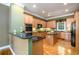 Well-appointed kitchen features granite counters and stainless appliances at 10090 Jones Bridge Rd # 2, Alpharetta, GA 30022
