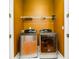 Functional laundry room with modern washer and dryer units at 10090 Jones Bridge Rd # 2, Alpharetta, GA 30022