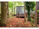 Home exterior with wooded backyard at 3001 Majestic Park Ct, Duluth, GA 30096