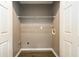 Walk-in closet with gray walls, wire shelving, and wood-look vinyl floors at 3001 Majestic Park Ct, Duluth, GA 30096