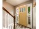 Inviting entryway with wood-look flooring, a stylish front door, and staircase at 3001 Majestic Park Ct, Duluth, GA 30096