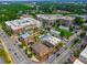 Aerial view of community with stores, apartments, green space, and parks at 3680 Milton Park Dr, Alpharetta, GA 30022