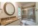 Bathroom featuring granite countertops, vanity, toilet, and shower/tub at 3680 Milton Park Dr, Alpharetta, GA 30022