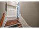 Entryway offers hardwood stairs, coat rack and storage, enhancing functionality and style at 3680 Milton Park Dr, Alpharetta, GA 30022