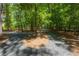 Community walking trails through green space and mature trees at 3680 Milton Park Dr, Alpharetta, GA 30022