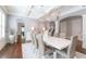 Formal dining room featuring hardwood floors, modern lighting, and refined wall paneling at 44 Barbara Ln, Atlanta, GA 30327