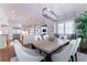 Dining area adjacent to the kitchen with natural light and stylish furniture at 44 Barbara Ln, Atlanta, GA 30327
