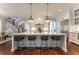 Spacious kitchen with a large island, stainless steel appliances, and elegant lighting fixtures at 44 Barbara Ln, Atlanta, GA 30327