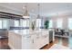 Open concept Kitchen Island leading to Living and Dining areas at 44 Barbara Ln, Atlanta, GA 30327