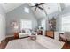 Spacious living room featuring high ceilings, bright windows, and stylish decor, creating a versatile space at 44 Barbara Ln, Atlanta, GA 30327