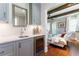 Wet bar featuring gray cabinets, marble countertops, stainless wine cooler, and hardwood floors at 44 Barbara Ln, Atlanta, GA 30327