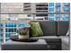 Close up of a cozy balcony with comfortable seating and plants at 45 Ivan Allen Jr Nw Blvd # 1702, Atlanta, GA 30308