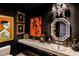 Elegant powder room with unique art, decorative mirror and fixtures at 45 Ivan Allen Jr Nw Blvd # 1702, Atlanta, GA 30308