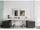 Bright bathroom featuring double sink vanity with elegant fixtures and modern mirrors at 45 Ivan Allen Jr Nw Blvd # 1702, Atlanta, GA 30308