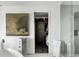 Modern bathroom featuring a glass-enclosed shower and a walk-in closet at 45 Ivan Allen Jr Nw Blvd # 1702, Atlanta, GA 30308