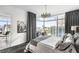 Stylish bedroom with city views, modern art, and an open-concept design at 45 Ivan Allen Jr Nw Blvd # 1702, Atlanta, GA 30308