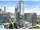 Modern high-rise building with glass facade showcasing its contemporary design against a vibrant city skyline at 45 Ivan Allen Jr Nw Blvd # 1702, Atlanta, GA 30308