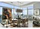A modern dining room offers city views, art and a wet bar at 45 Ivan Allen Jr Nw Blvd # 1702, Atlanta, GA 30308
