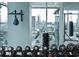 Gym equipped with weights and punching bags, complemented by large windows offering city views for an inspiring workout space at 45 Ivan Allen Jr Nw Blvd # 1702, Atlanta, GA 30308
