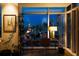 A modern home office boasts breathtaking city views through expansive windows, inspiring productivity at 45 Ivan Allen Jr Nw Blvd # 1702, Atlanta, GA 30308
