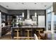 Sleek kitchen featuring modern cabinets, stainless steel appliances, and an island with seating at 45 Ivan Allen Jr Nw Blvd # 1702, Atlanta, GA 30308