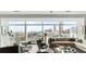 Spacious living room with comfortable seating, stylish decor, and expansive windows showcasing scenic city views at 45 Ivan Allen Jr Nw Blvd # 1702, Atlanta, GA 30308