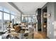 Elegant living room featuring floor-to-ceiling windows, modern furniture, and sophisticated decor at 45 Ivan Allen Jr Nw Blvd # 1702, Atlanta, GA 30308