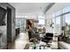 Spacious living area with floor-to-ceiling windows and stylish decor, including a dining area at 45 Ivan Allen Jr Nw Blvd # 1702, Atlanta, GA 30308