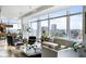 Bright living room featuring expansive city views from floor-to-ceiling windows at 45 Ivan Allen Jr Nw Blvd # 1702, Atlanta, GA 30308