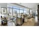 Modern living room featuring stylish furnishings, city views, and a chic bar cart for entertainment at 45 Ivan Allen Jr Nw Blvd # 1702, Atlanta, GA 30308