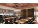 Upscale restaurant with wood-slat ceiling, modern decor and ambient lighting creates a stylish and inviting dining space at 45 Ivan Allen Jr Nw Blvd # 1702, Atlanta, GA 30308