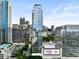 Atlanta cityscape featuring a modern glass skyscraper with a W logo and nearby buildings against a clear sky at 45 Ivan Allen Jr Nw Blvd # 1702, Atlanta, GA 30308