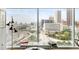 Stunning city view from a high-rise apartment with floor-to-ceiling windows and stylish seating at 45 Ivan Allen Jr Nw Blvd # 1702, Atlanta, GA 30308