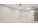 Unfinished bedroom features smooth walls, recessed lighting, and an open door at 1059 Woodland Ave, Atlanta, GA 30316