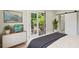 Relaxing main bedroom features white walls, balcony access, and modern minimalist decor at 1059 Woodland Ave, Atlanta, GA 30316