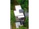 Aerial view of a contemporary home featuring a flat roof and a well-maintained, modern design with a driveway at 187 Clay Se St, Atlanta, GA 30317