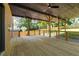 Spacious wooden deck with a natural finish, supported by wooden beams and railing, perfect for outdoor relaxation at 187 Clay Se St, Atlanta, GA 30317