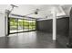 Modern garage featuring a glass panel door, providing natural light and a sleek, contemporary look at 187 Clay Se St, Atlanta, GA 30317