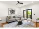Cozy living room with hardwood floors, stylish furniture, and large windows offering natural light and views at 187 Clay Se St, Atlanta, GA 30317