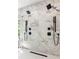 Modern shower area featuring dual shower heads, marble walls, and elegant fixtures at 187 Clay Se St, Atlanta, GA 30317