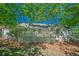 Backyard view featuring a wooden deck with a white wooden fence at 2492 Bermuda Dr, Loganville, GA 30052