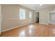 Dining area showcasing wood flooring, natural light, and neutral paint at 2492 Bermuda Dr, Loganville, GA 30052