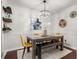 Chic dining room featuring a modern chandelier, stylish seating, and trendy wall decor accents at 3701 Essex Ave # 2, Atlanta, GA 30339