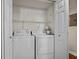 Laundry room features a full sized washer and dryer inside of a closet at 3701 Essex Ave # 2, Atlanta, GA 30339