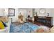 Comfortable living room with a decorative fireplace and plush seating, ideal for relaxing and entertaining at 3701 Essex Ave # 2, Atlanta, GA 30339