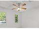 This bedroom has neutral walls, carpet, and an overhead fan at 4331 Volnay Ne Ct, Marietta, GA 30066